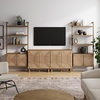 image:imageNathan James Kova Boho Rattan and Wood TV Wall Shelving Unit Accent Storage Cabinet in Black Wood and Rattan with Metal Frame and Cane Doors Black OakCaneLight Brown
